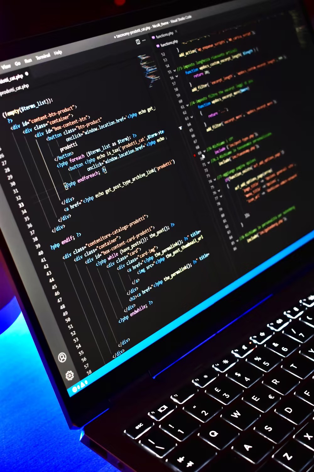Laptop screen showing fullstack code with frontend and backend interfaces
